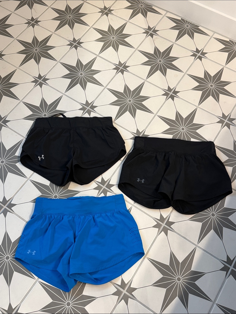Under Armour Women’s Athletic Shorts — 2 pairs 2 Black & 1 Blue